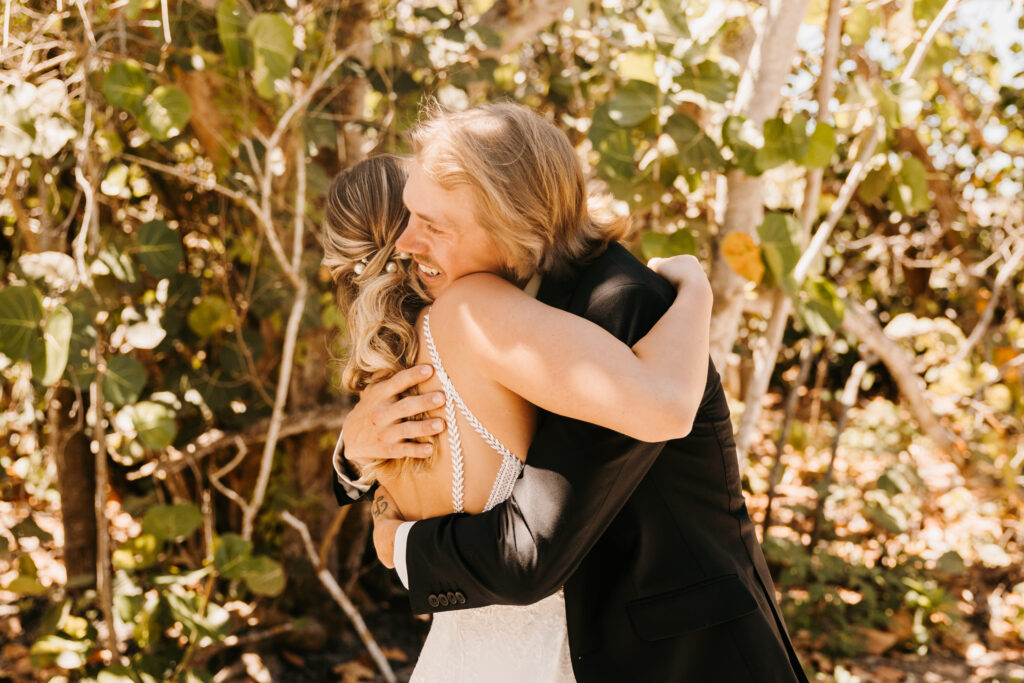 couple hugging after first look