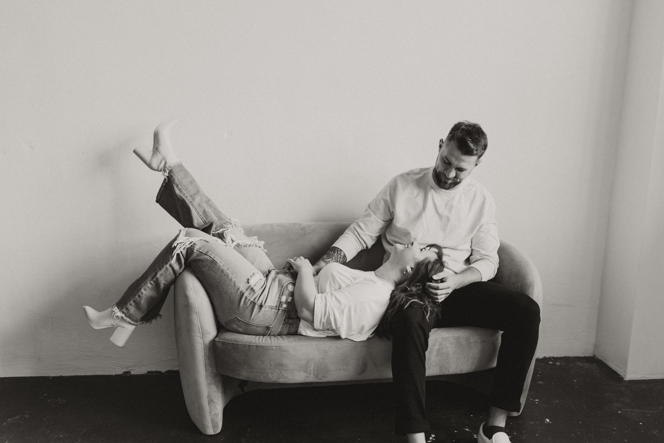 couple poses on studio couch